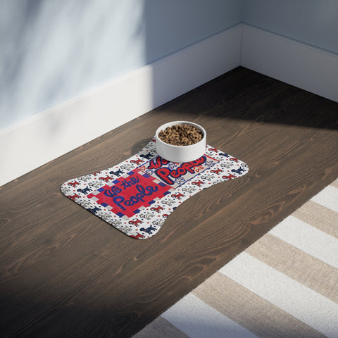 Red, white, and blue pet feeding mat with "We The People" calligraphy design, made by Printify for pet feeding accessories.