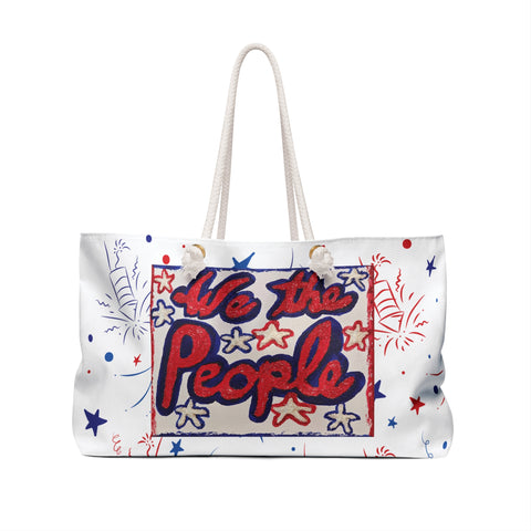 Tote bag with 'We the People' text and patriotic design on a white background